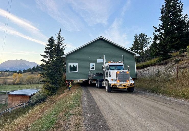 Completed Jayco RTM home being transported on a trailer
