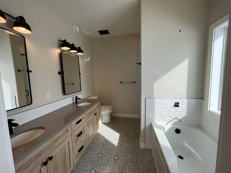 Double vanity and tub bathroom