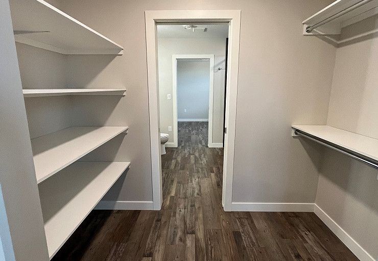 Custom Everest I Prairie Edition — walk-through closet connecting the bedroom and ensuite