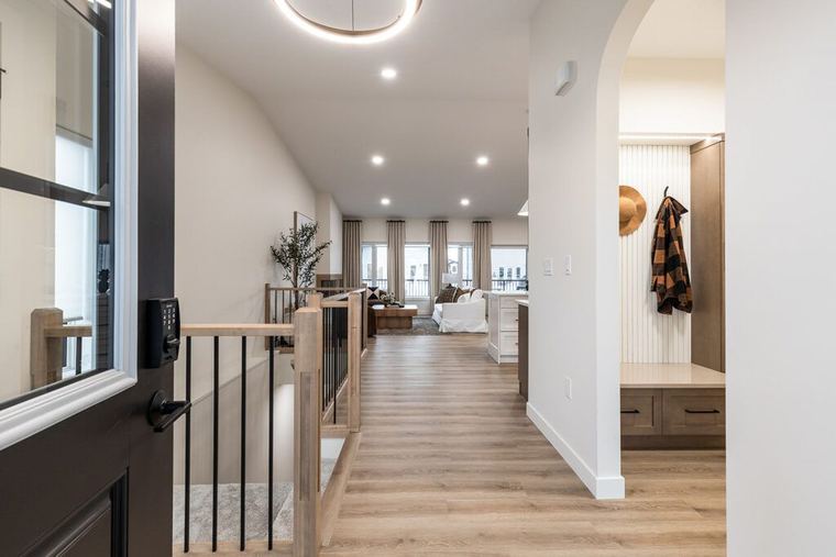 The Devon — bright entry corridor connecting the mudroom, kitchen and living spaces