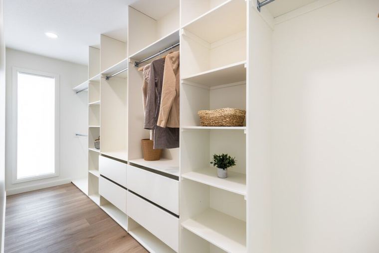 The Fairview — custom walk-in closet with drawers, shelving and natural light