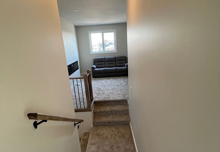 Upper level lounge and stair hall