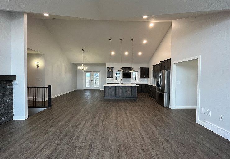 Custom Everest I Prairie Edition — broad open-concept living, dining and kitchen layout