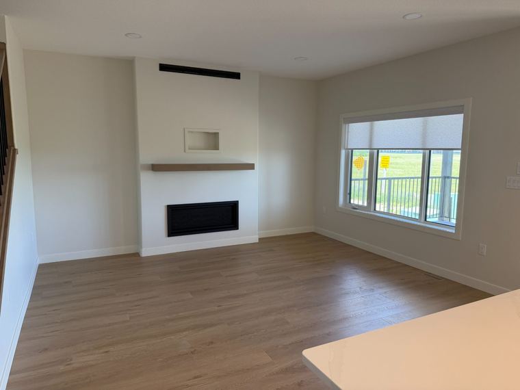 Living room with modern linear fireplace