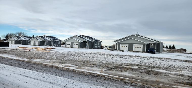 Purpose-built rental community progressing through phased winter construction.