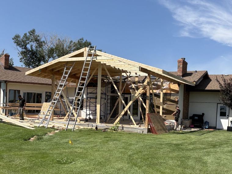 Major roof and addition framing in progress
