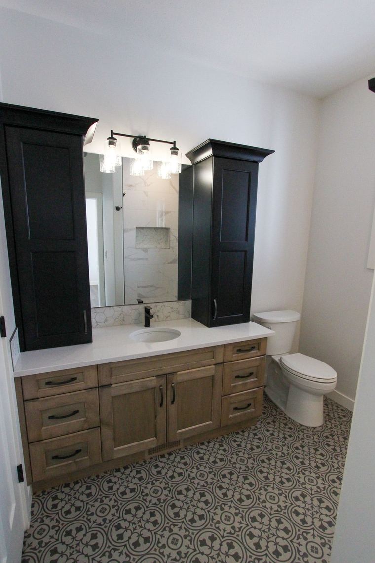 RTM showhome — bathroom with custom vanity and patterned tile floor