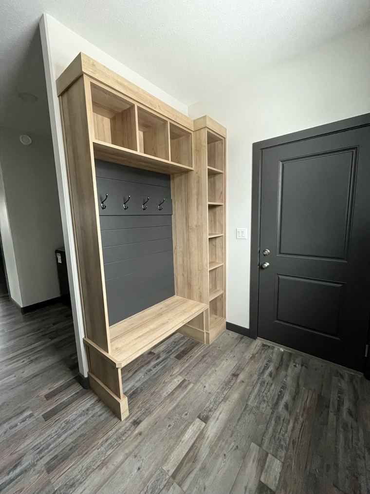 Prairie farmhouse RTM — custom mudroom bench, hooks and entry storage