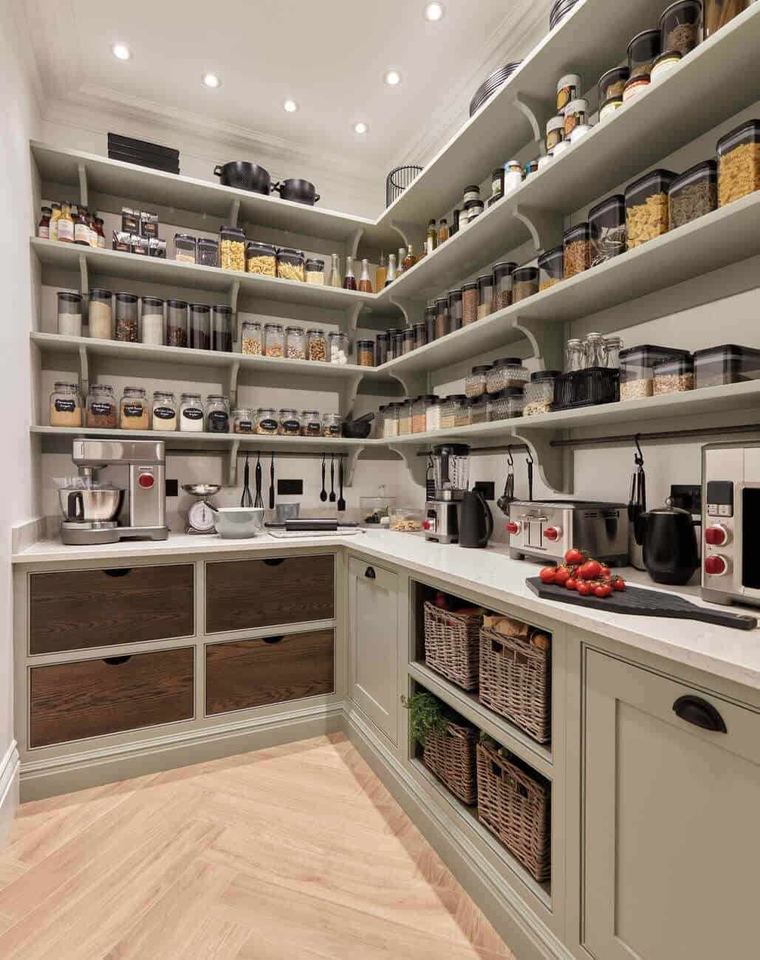 RTM home — walk-in pantry with wraparound shelving and dedicated appliance counter