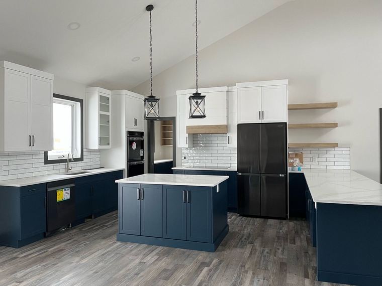 Prairie farmhouse RTM — two-tone kitchen with quartz counters and open shelving